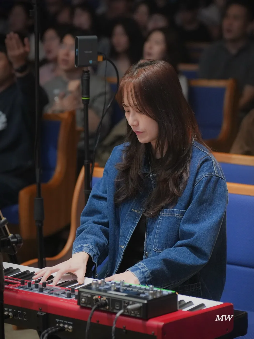 A musician playing keyboard