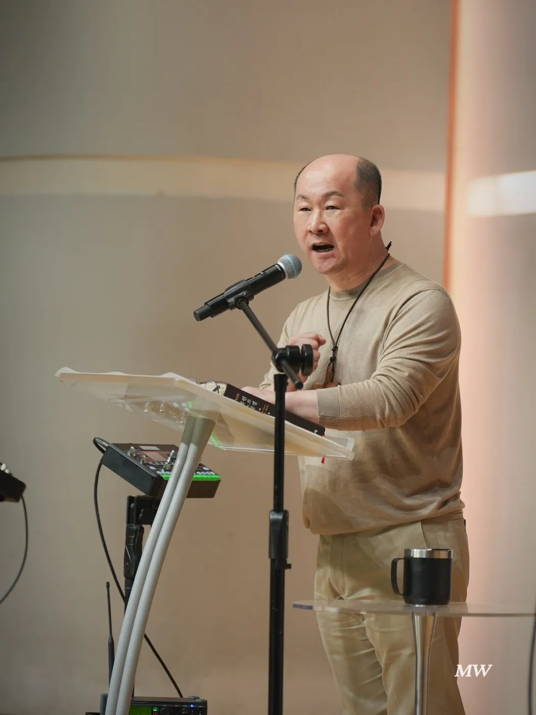 A preacher delivering the message from the pulpit